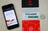image of  cell phone, back of gift card with code scratched